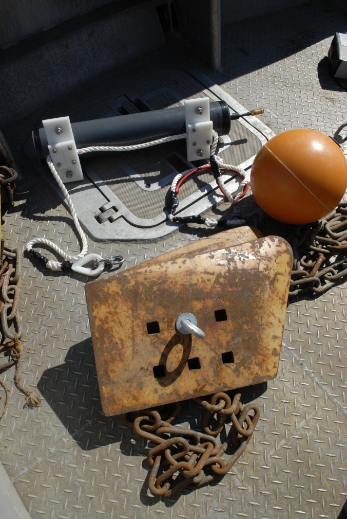 One of the sound recording instruments lays on the deck of the Anchor Point prior to deployment.